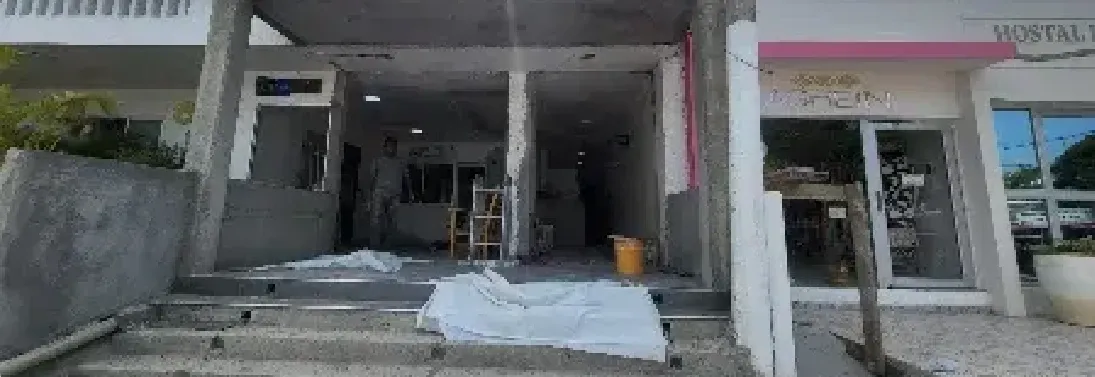 Fachada comercial antes de la intervención